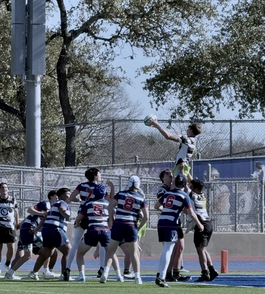 A Black Knights jumper reaches for the ball in a lineout
